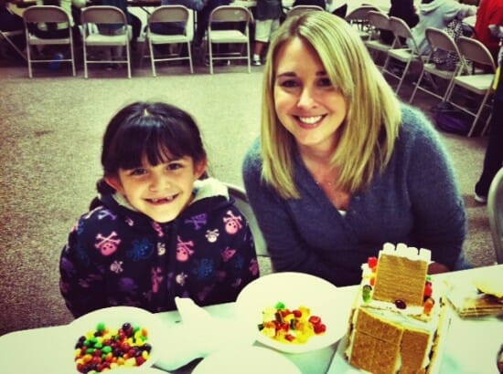 Julianna and Carla were all smiles while building their gingerbread house